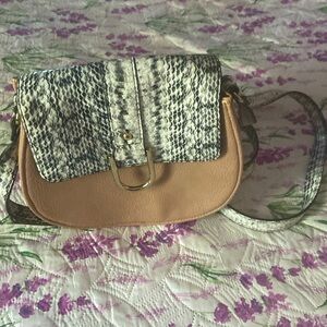 Beige and snake print crossbody bag.